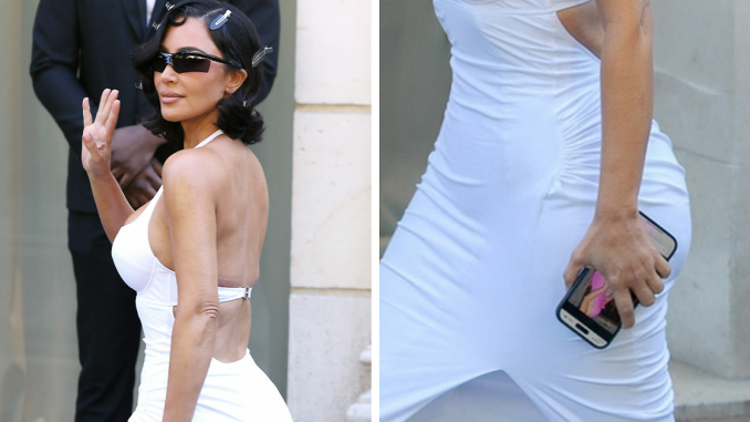 Kim Kardashian Caught Googling Herself While Wearing Controversial Brand At Paris Fashion Week